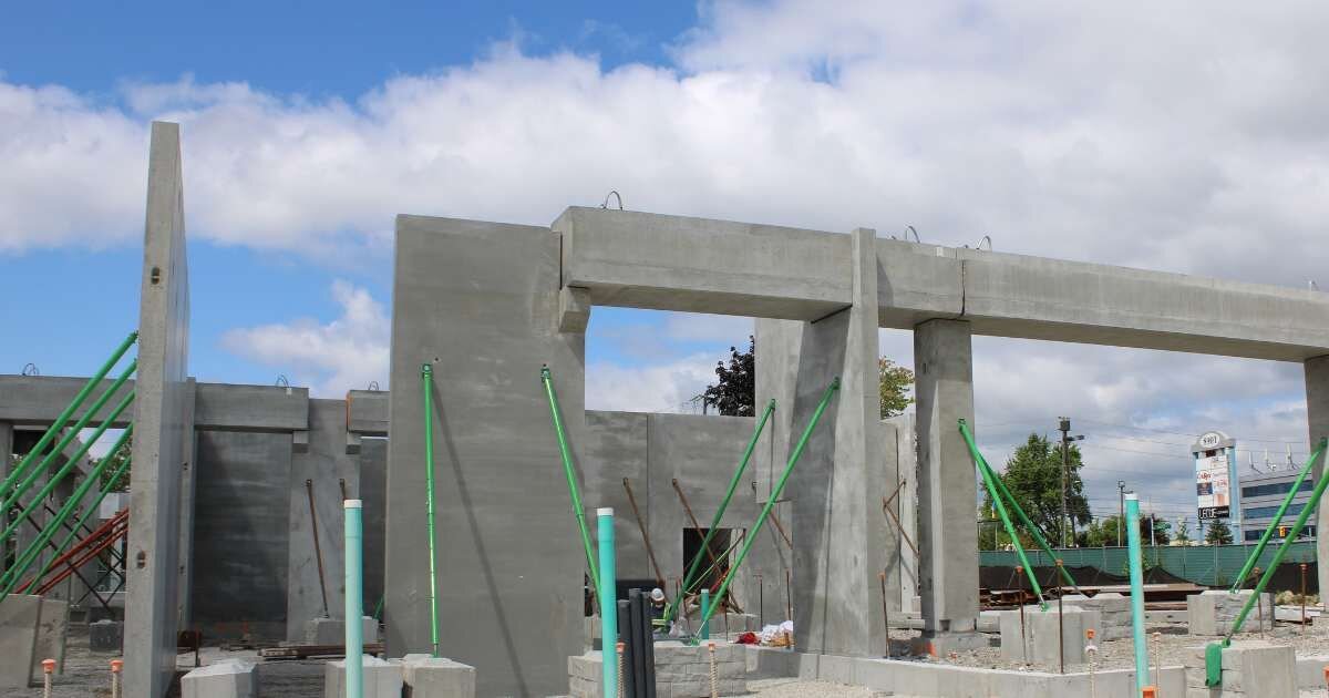 construction site with land markers and concrete walls 